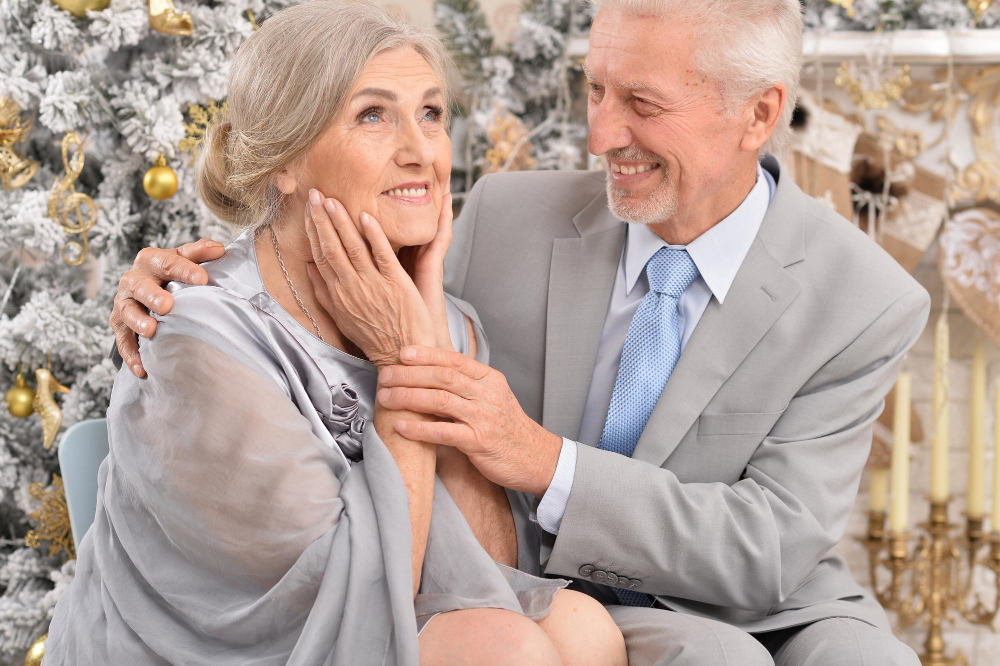 Mature couple chatting happily online